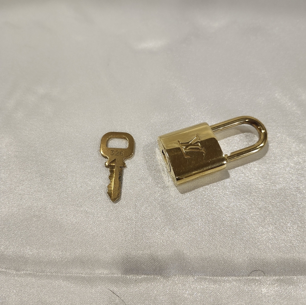 Louis Vuitton Gold Padlock and Key Set